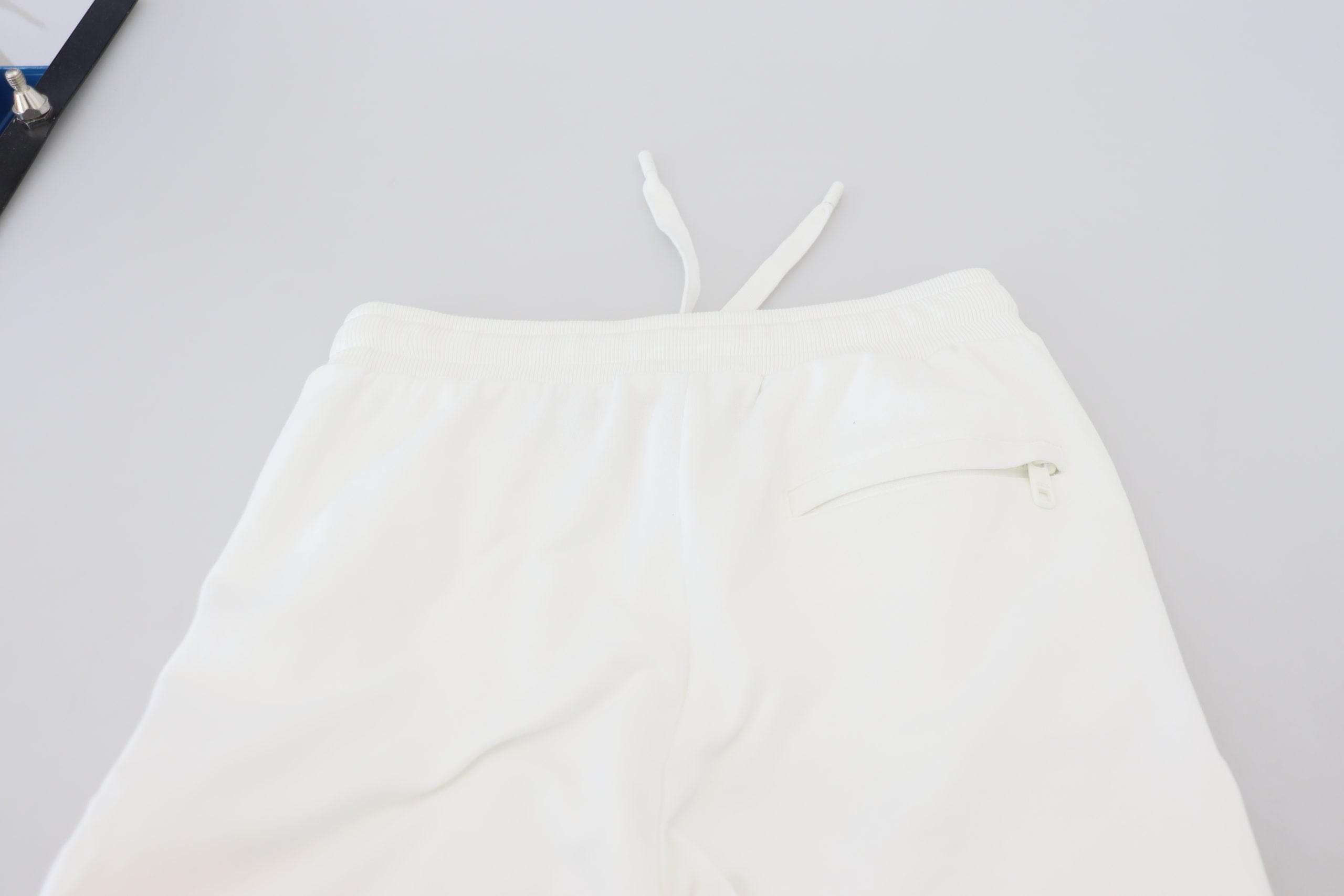 Dolce & Gabbana Elegant White Cotton Trousers - Hilstor