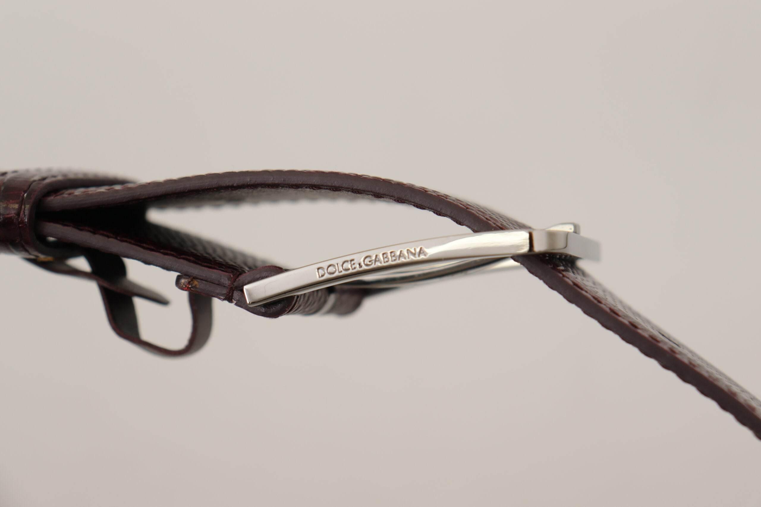 Dolce & Gabbana Elegant Maroon Leather Belt with Engraved Buckle - Hilstor