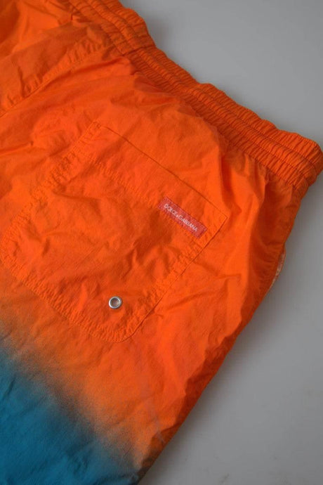 Dolce & Gabbana Gradient Effect Swim Shorts in Vibrant Orange - Hilstor