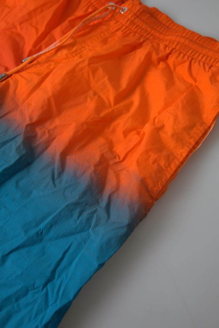 Dolce & Gabbana Gradient Effect Swim Shorts in Vibrant Orange - Hilstor
