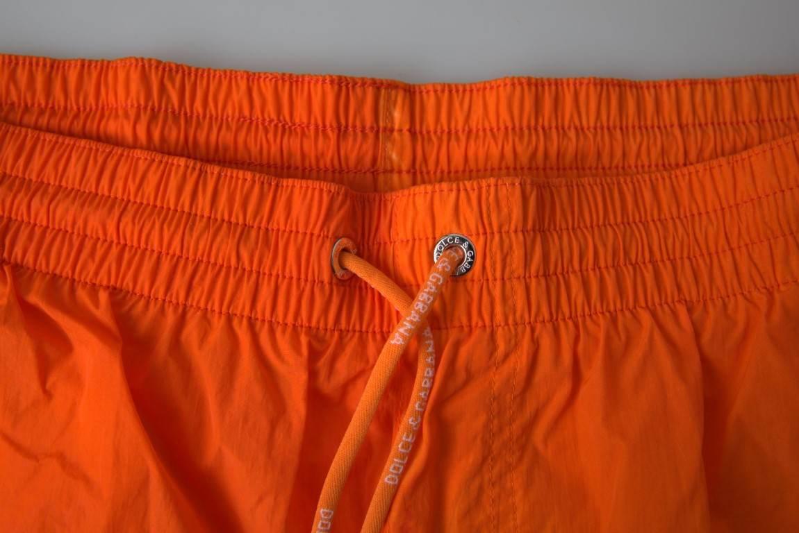 Dolce & Gabbana Gradient Effect Swim Shorts in Vibrant Orange - Hilstor
