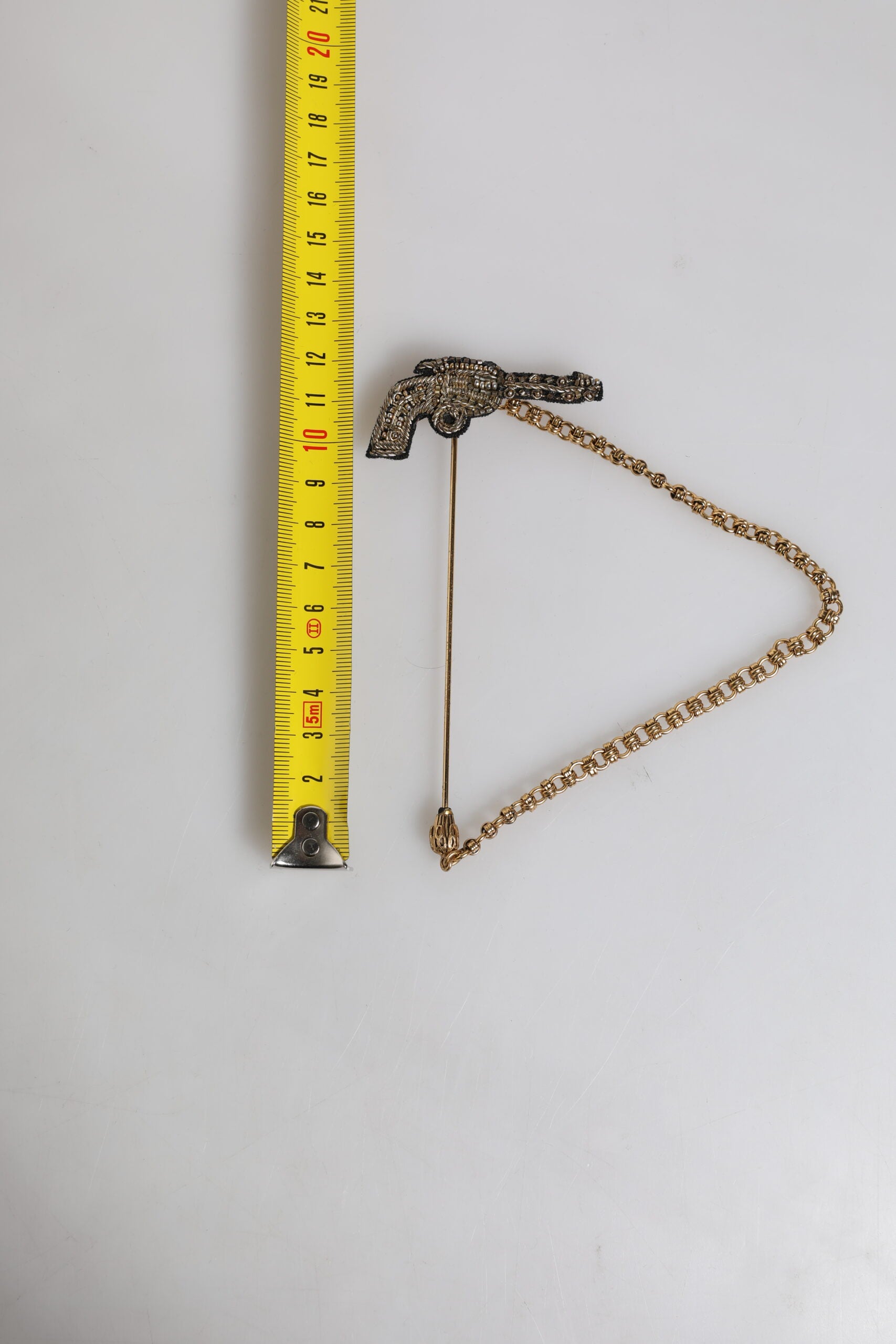 Dolce &amp; Gabbana Sort Guld Messing Kobber Revolver Broche Lapel Pin