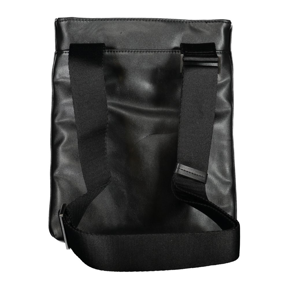 Calvin Klein elegant sort skuldertaske med kontrastdetaljer