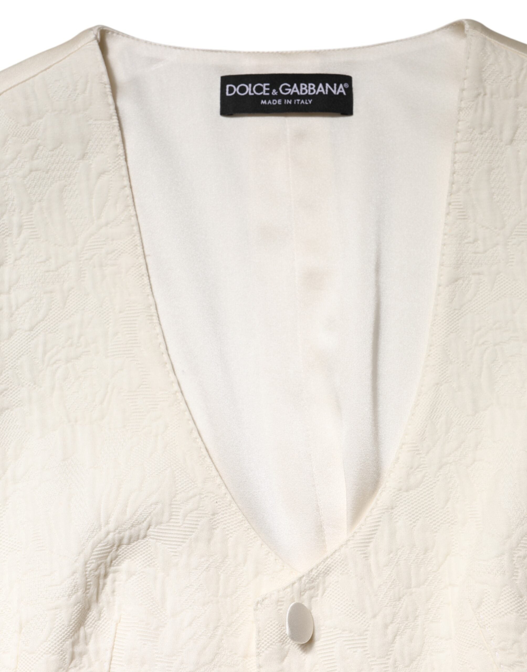 Dolce &amp; Gabbana Elfenbensfarvet bomulds-top med knapper og ærmer