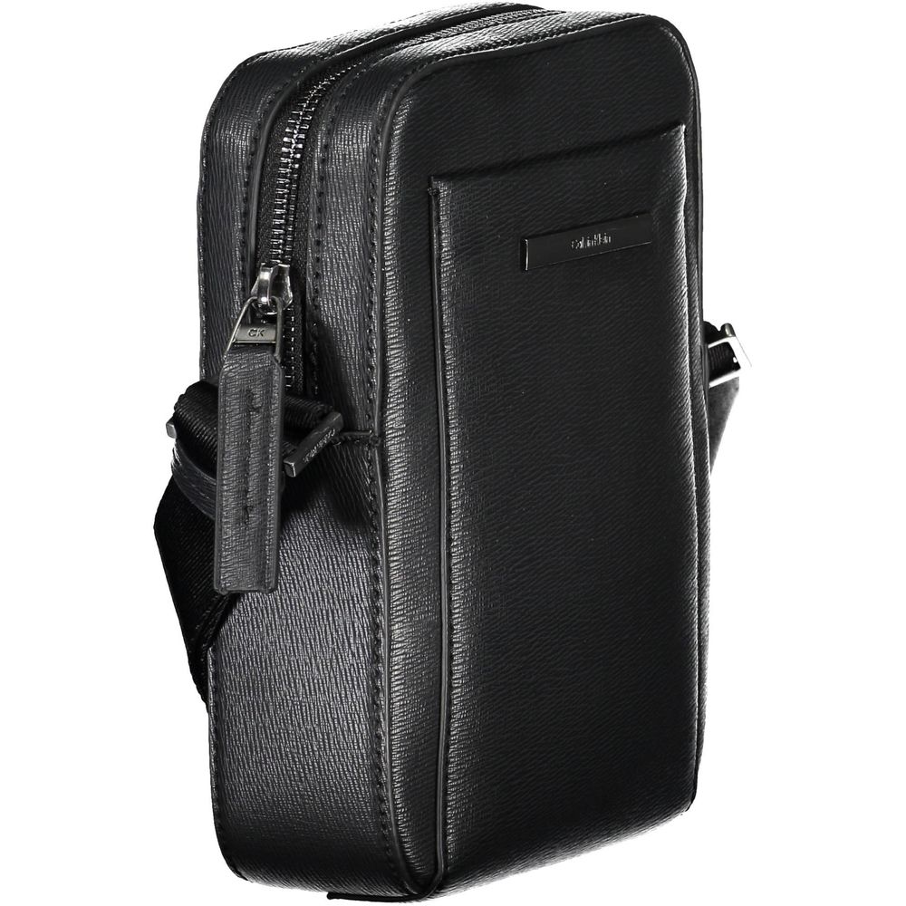 Calvin Klein Elegant sort skuldertaske med slanke detaljer