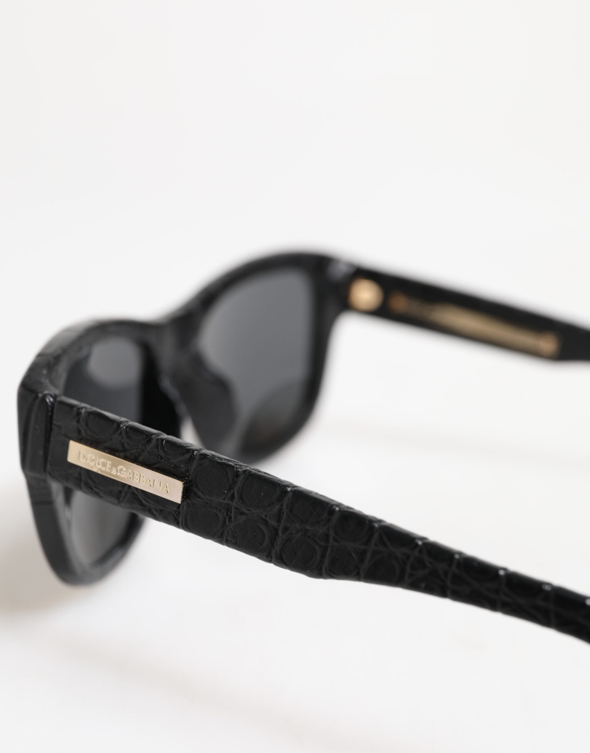 Dolce &amp; Gabbana DG4177 solbriller med sort læderstel og tonede glas