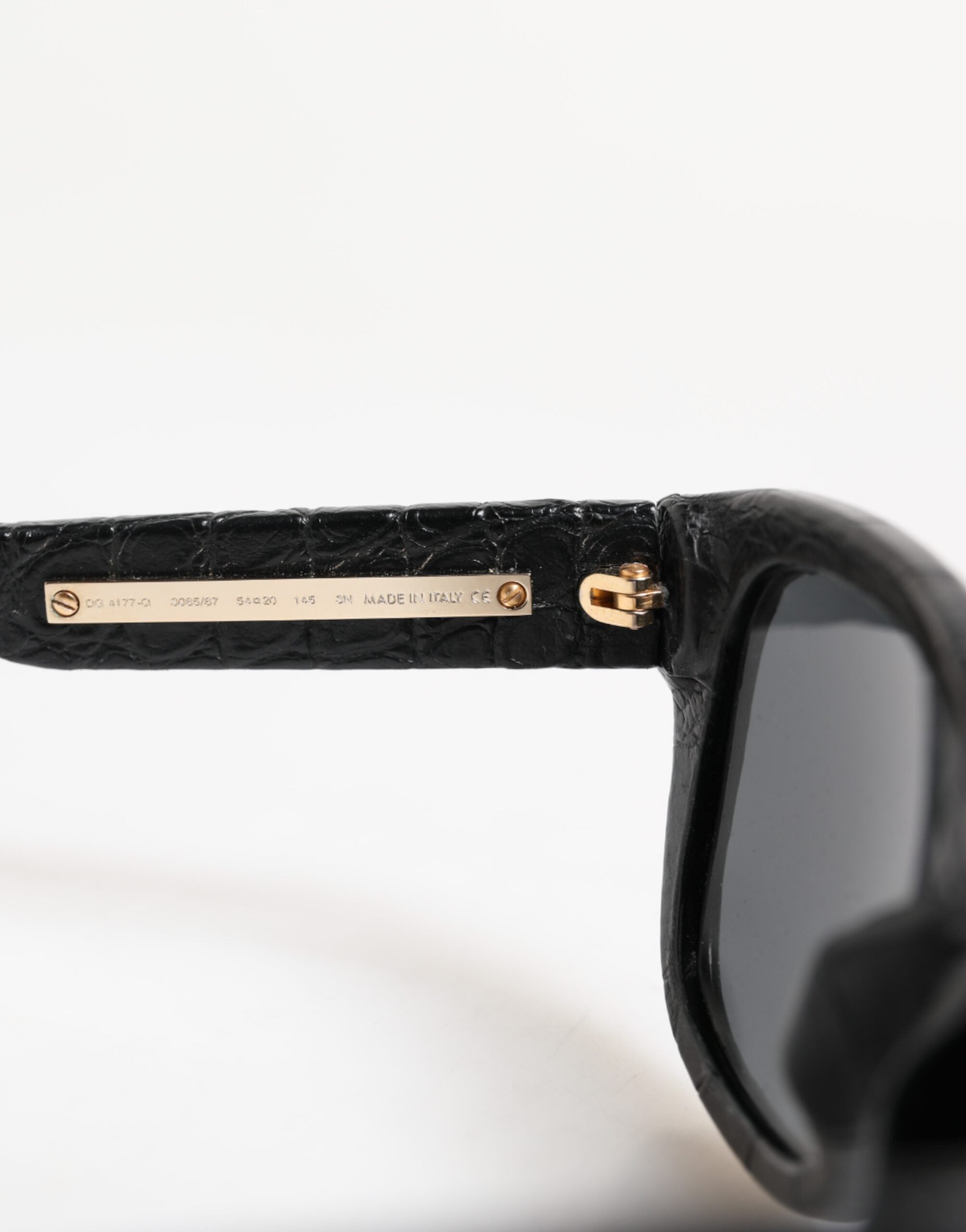 Dolce &amp; Gabbana DG4177 solbriller med sort læderstel og tonede glas