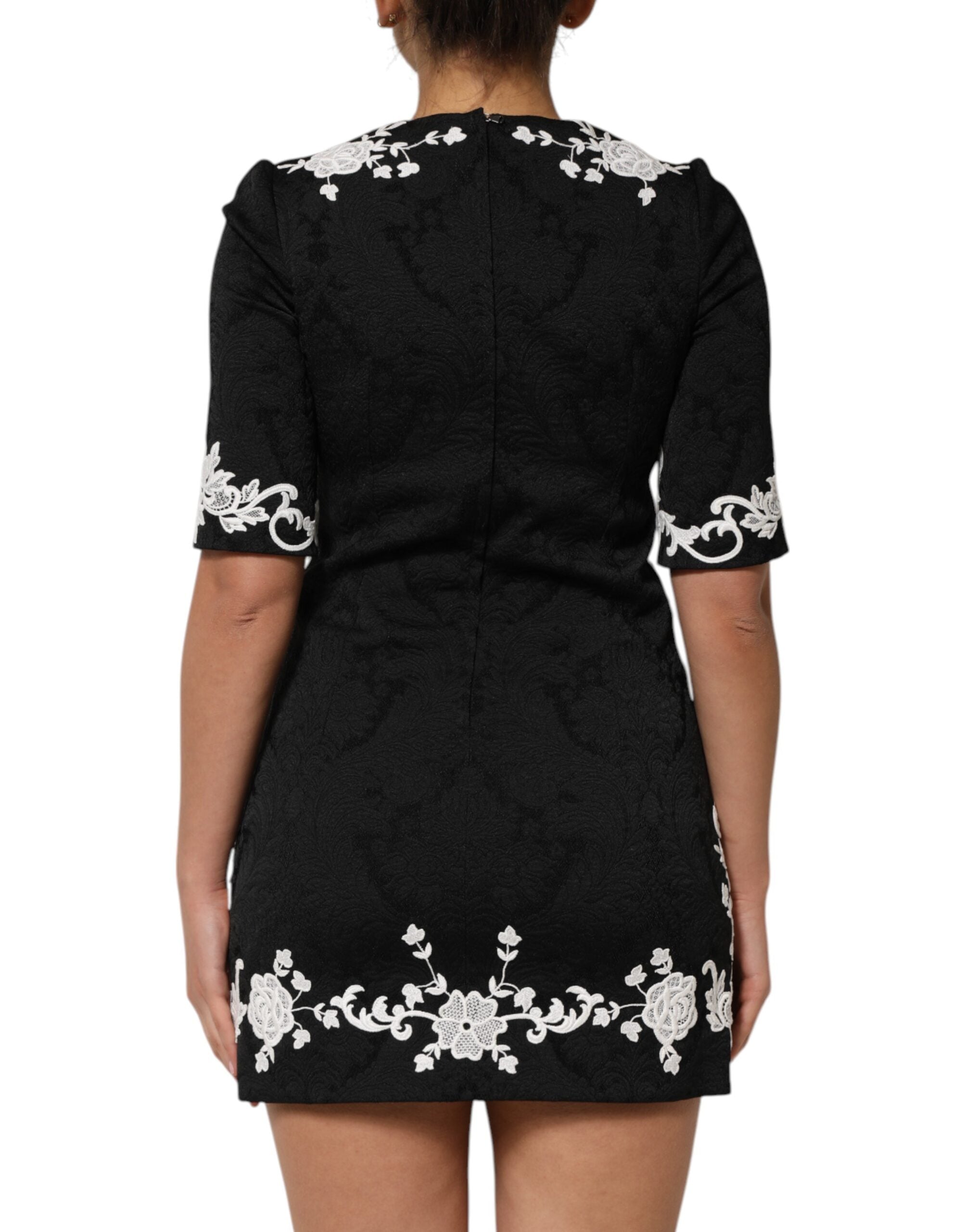 Dolce &amp; Gabbana Svart Spetsklänning Med Korta Ärmar Och A-linje