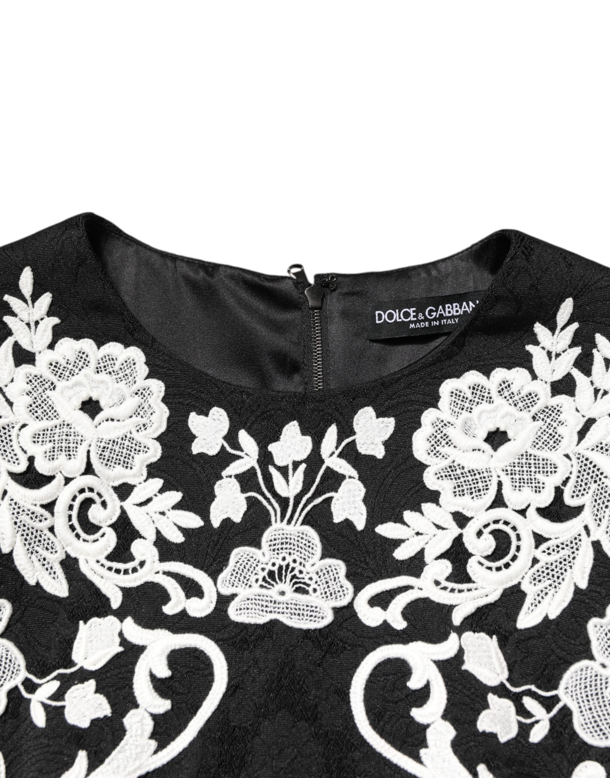 Dolce &amp; Gabbana Svart Spetsklänning Med Korta Ärmar Och A-linje