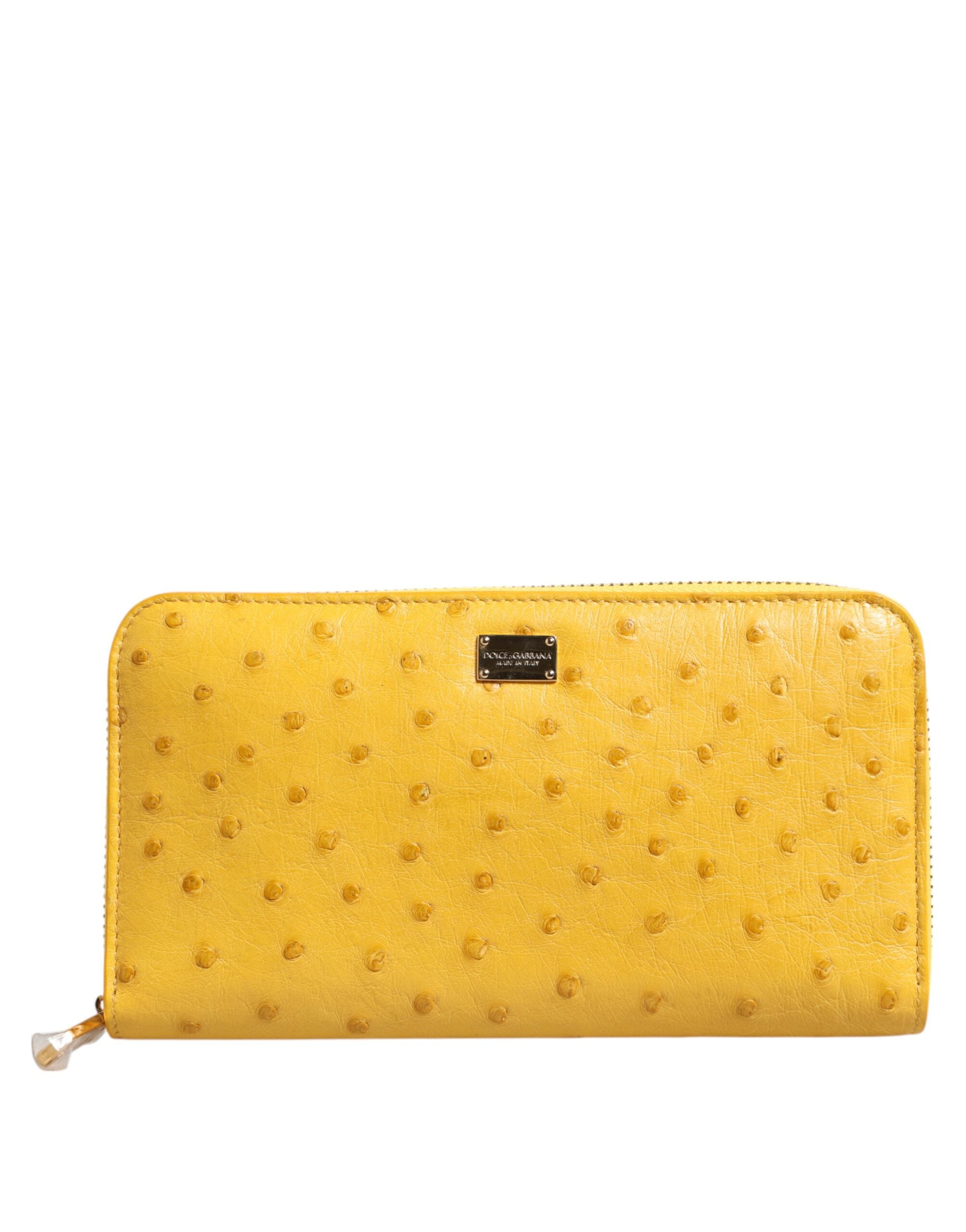 Dolce &amp; Gabbana Gul Läderlogotypplåt med Dragkedja Runt Continental Plånbok