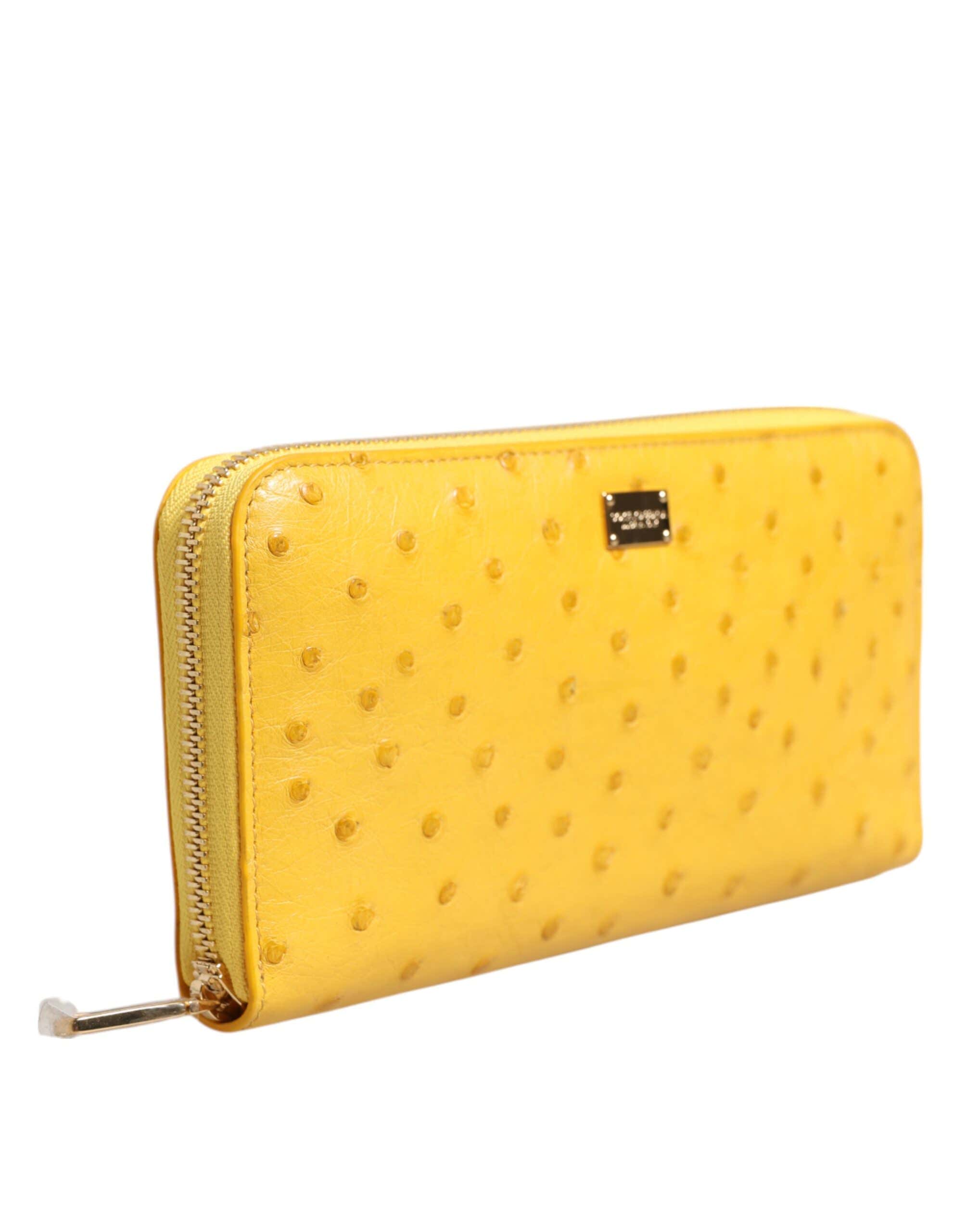 Dolce &amp; Gabbana Gul Läderlogotypplåt med Dragkedja Runt Continental Plånbok