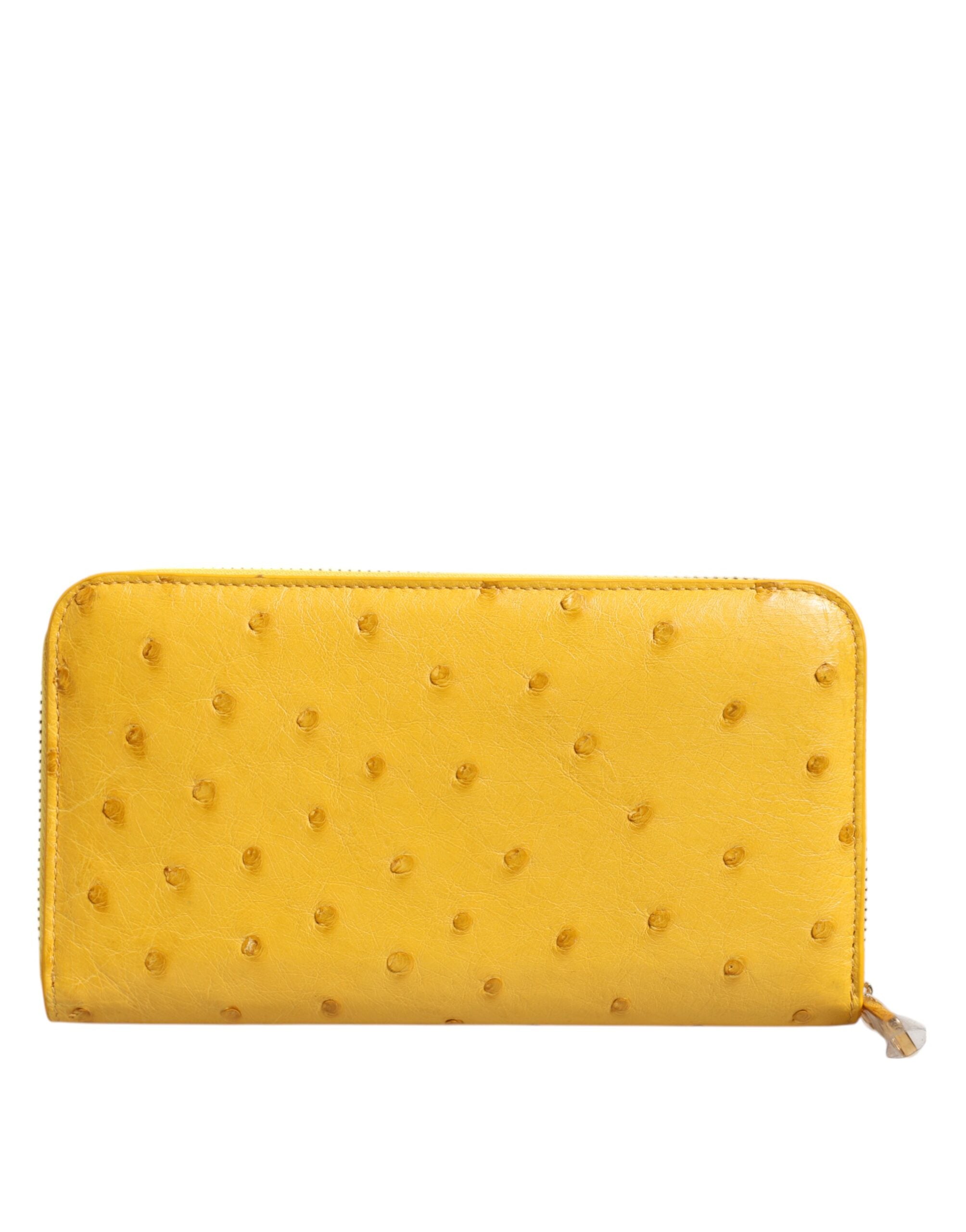 Dolce &amp; Gabbana Gul Läderlogotypplåt med Dragkedja Runt Continental Plånbok