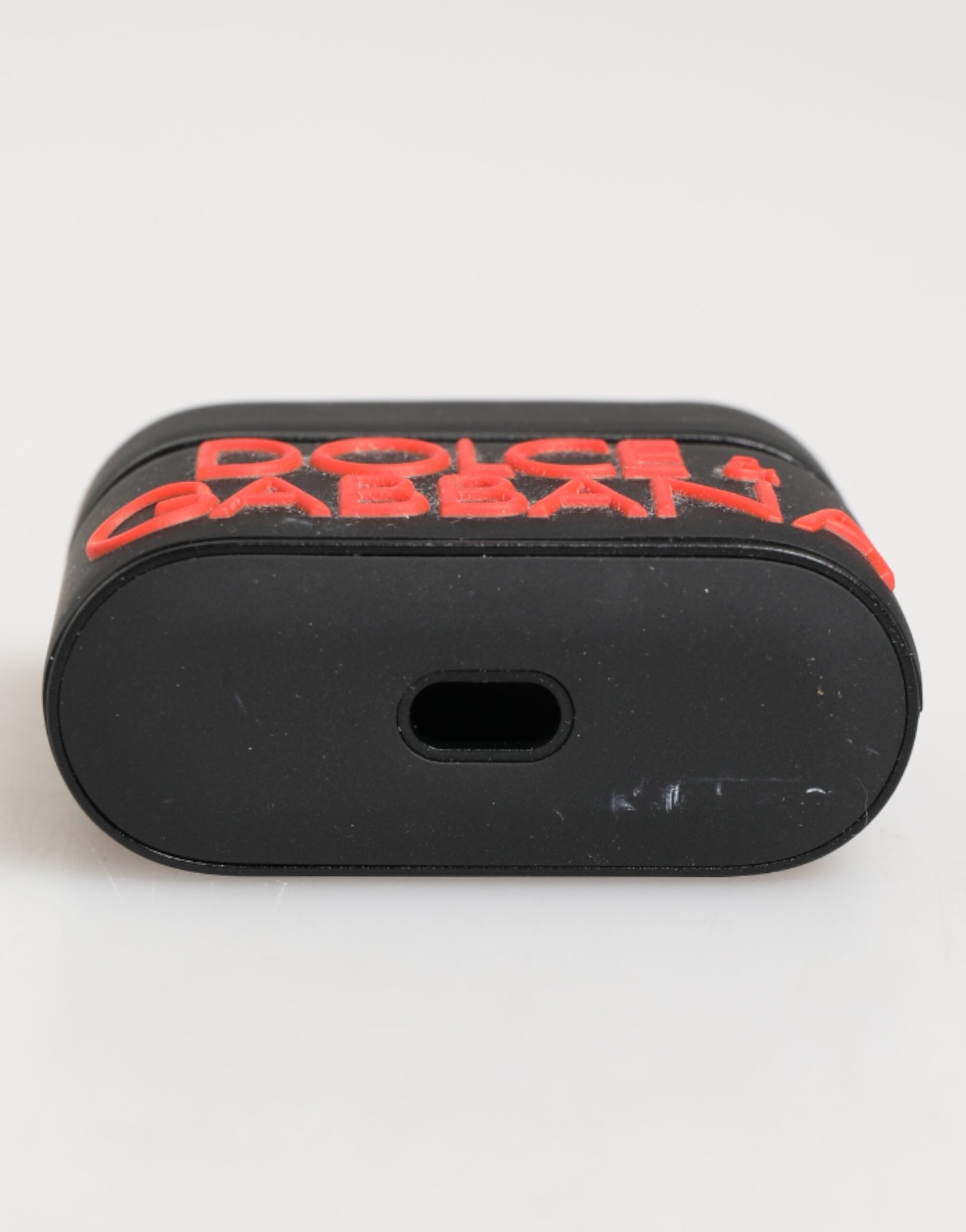 Dolce &amp; Gabbana Svart Orange Gummifodral med Präglad Logotyp och Tillbehör till Airpods