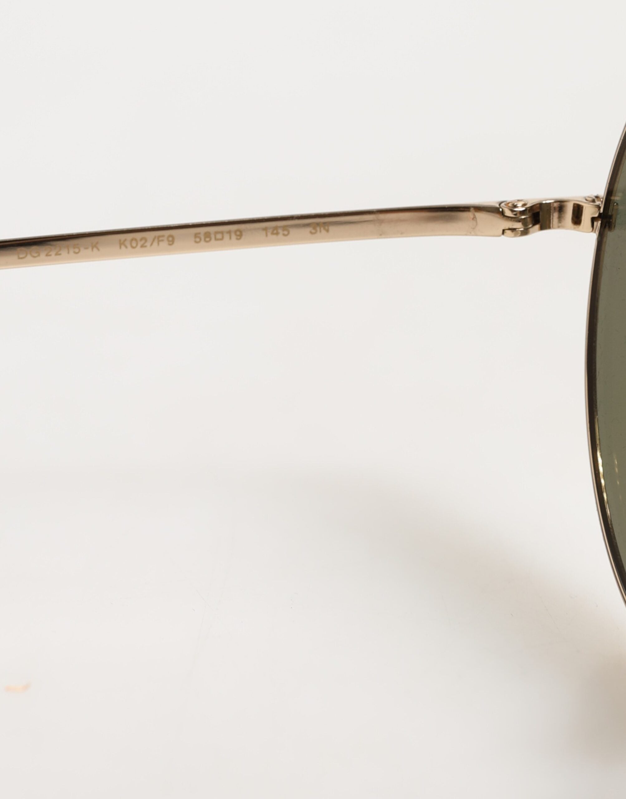 Dolce &amp; Gabbana guldfärgade metallrunda solglasögon