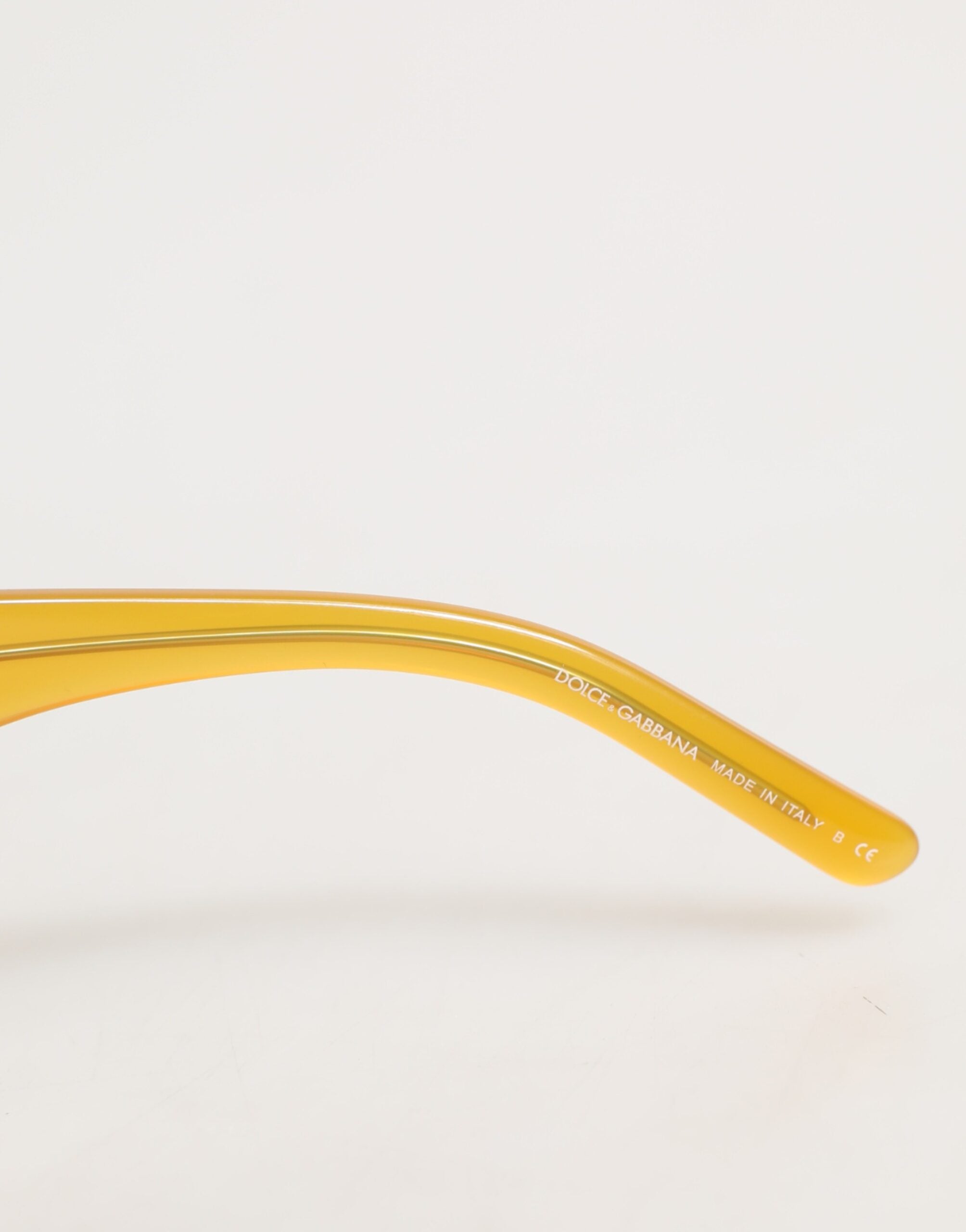 Dolce & Gabbana DG4177 solbriller med honningfarvet acetat og sorte tonede glas