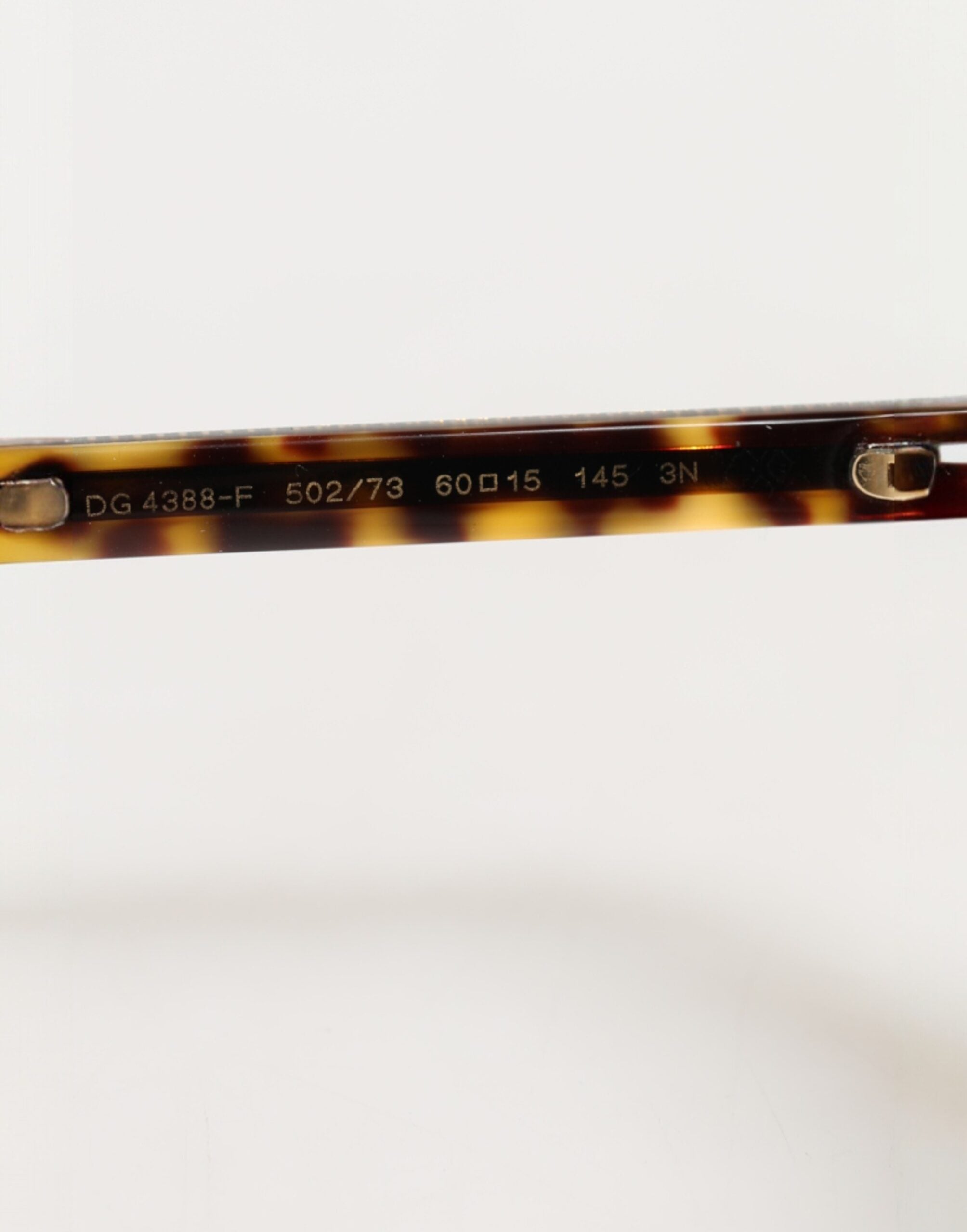 Dolce & Gabbana mørkebrune skildpaddeskjoldssolbriller med pilotstel