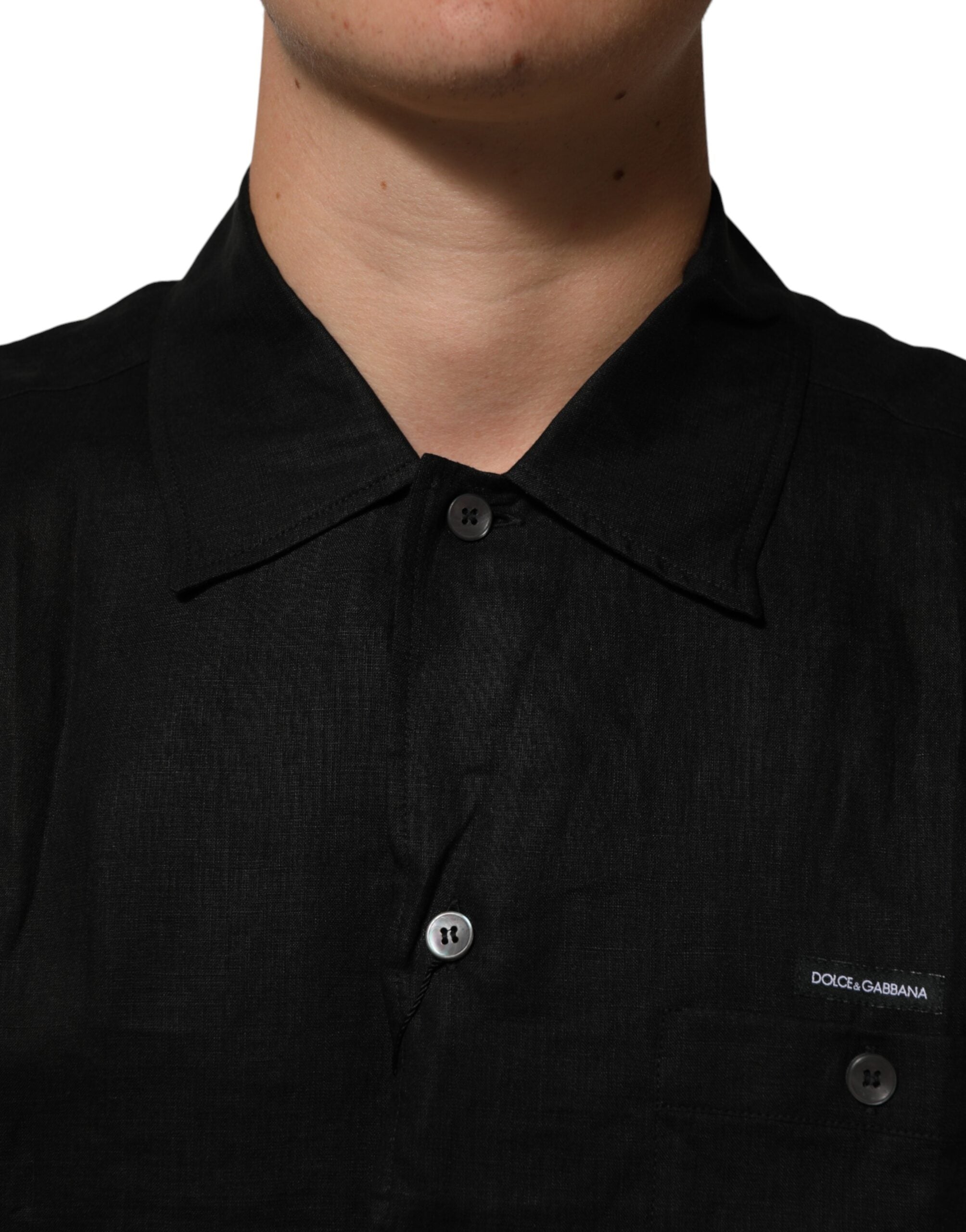 Carhartt WIP sort poloshirt med korte ærmer og krave i hør