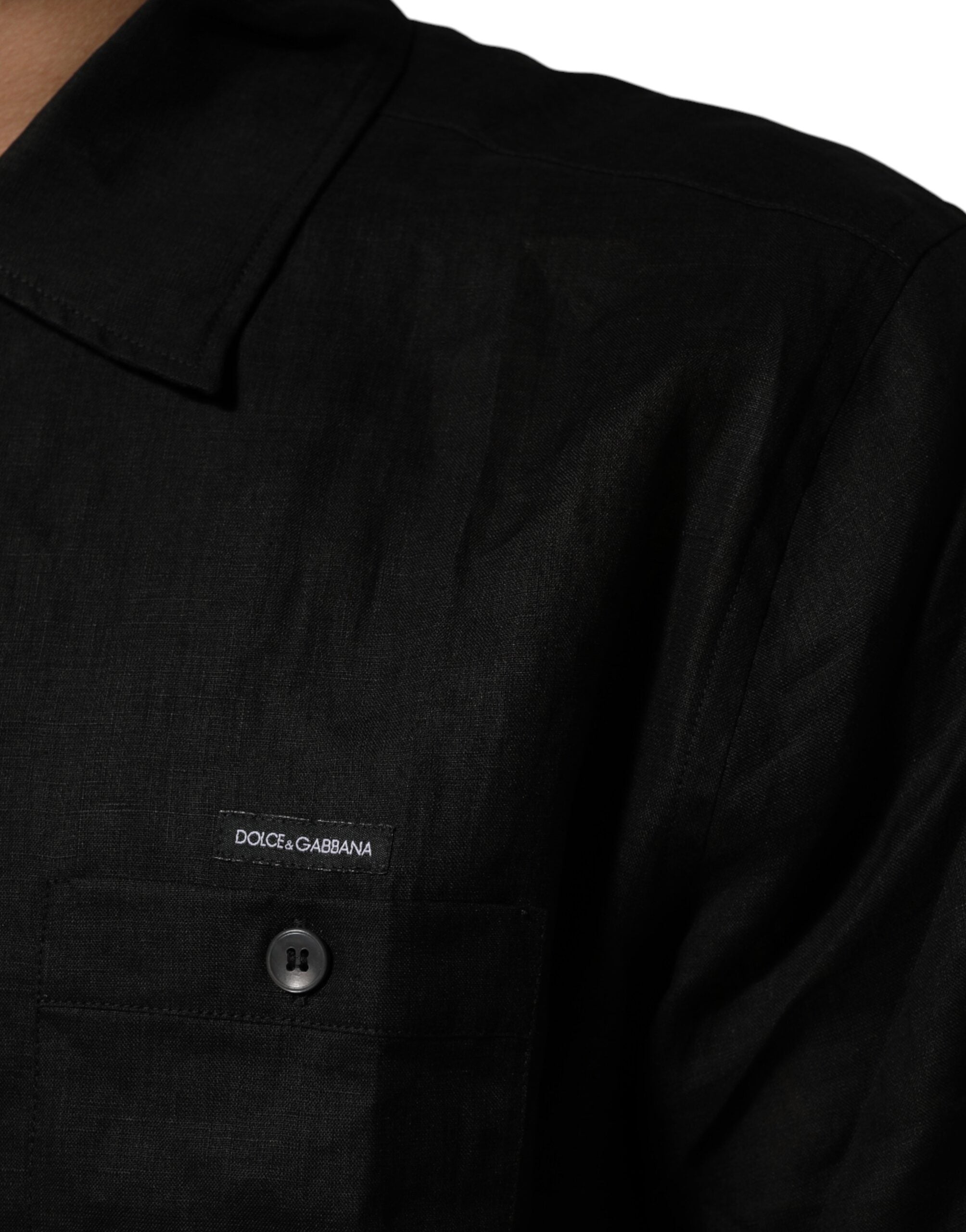 Carhartt WIP sort poloshirt med korte ærmer og krave i hør